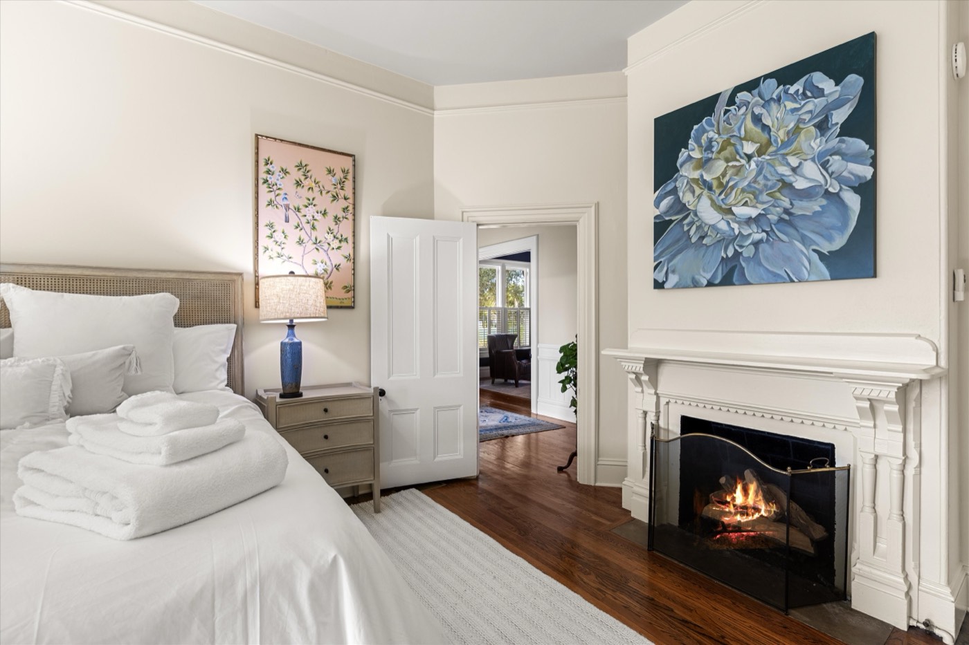 Bedroom with marble fireplace